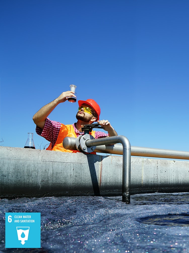 A man surveying the quality of water